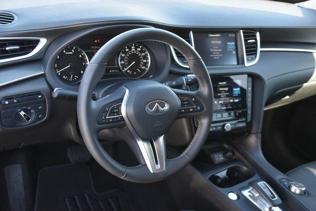 used 2025 INFINITI QX50 car, priced at $34,889