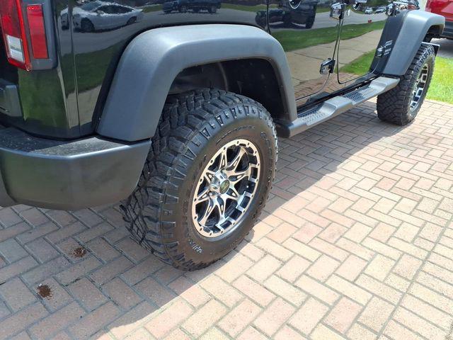 used 2014 Jeep Wrangler Unlimited car, priced at $16,304