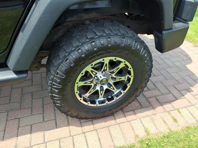 used 2014 Jeep Wrangler Unlimited car, priced at $16,304