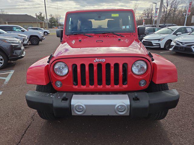 used 2014 Jeep Wrangler Unlimited car, priced at $14,153