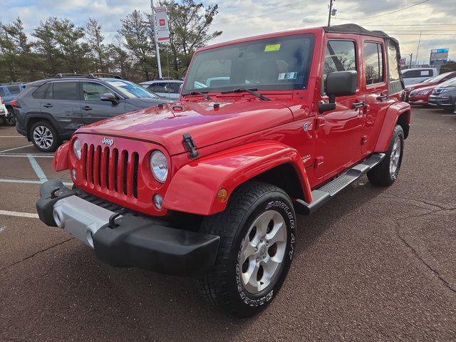 used 2014 Jeep Wrangler Unlimited car, priced at $14,153