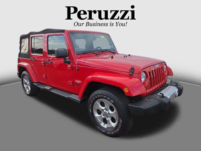 used 2014 Jeep Wrangler Unlimited car, priced at $14,153