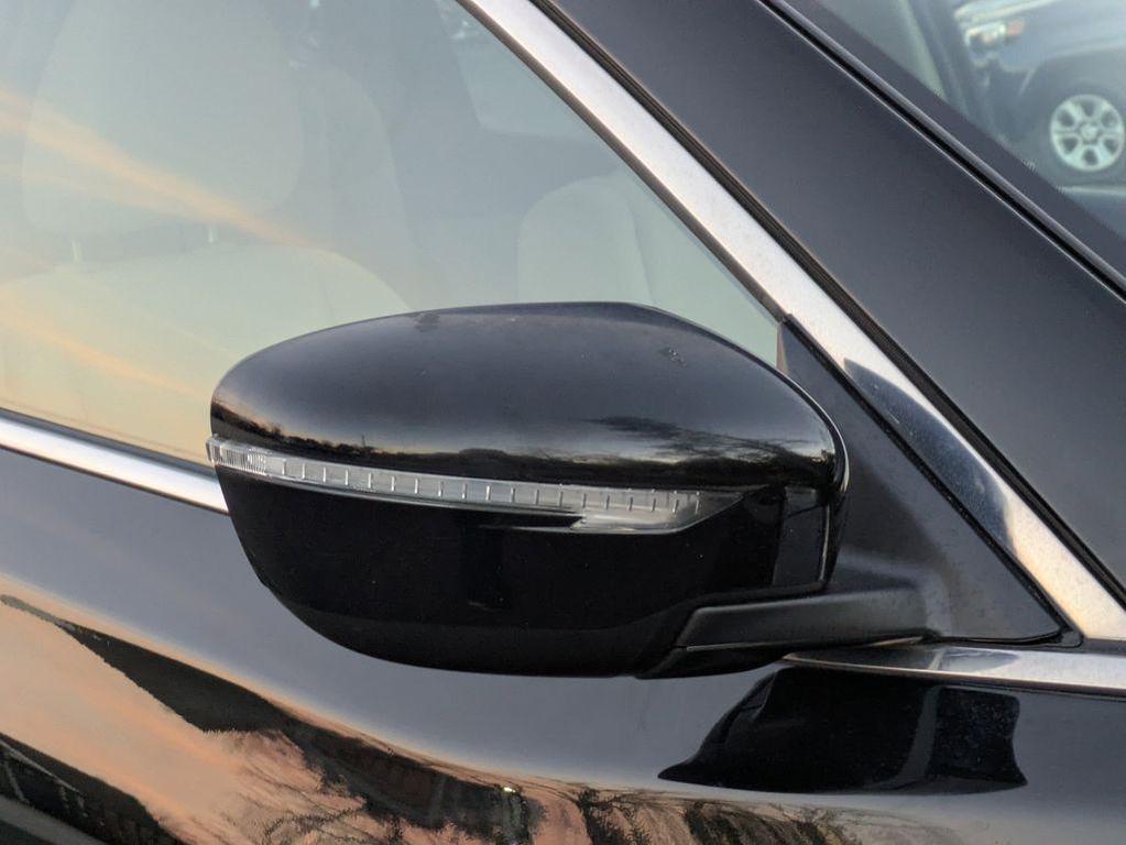 used 2015 Nissan Rogue car, priced at $10,291