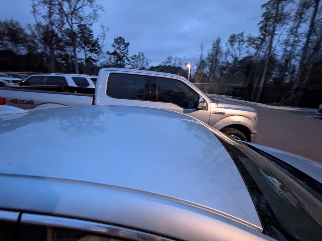 used 2018 Chevrolet Malibu car, priced at $17,291