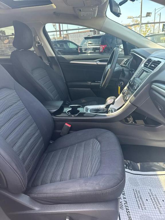 used 2016 Ford Fusion car, priced at $4,995