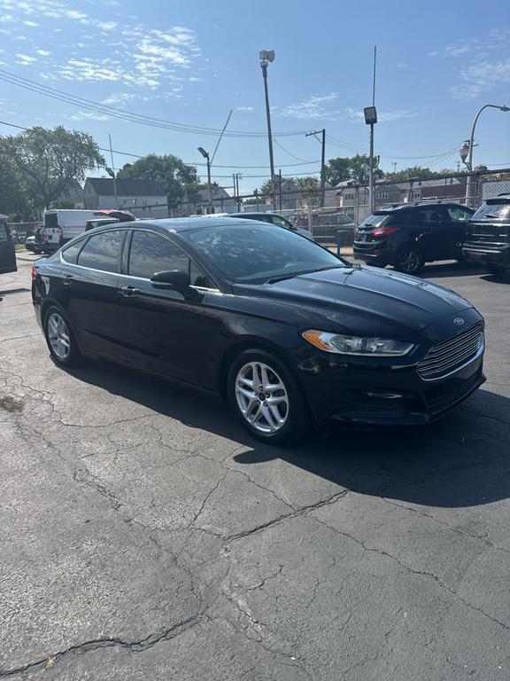 used 2016 Ford Fusion car, priced at $4,995