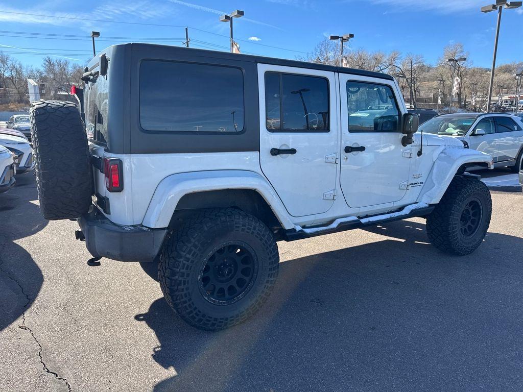 used 2015 Jeep Wrangler Unlimited car, priced at $15,991