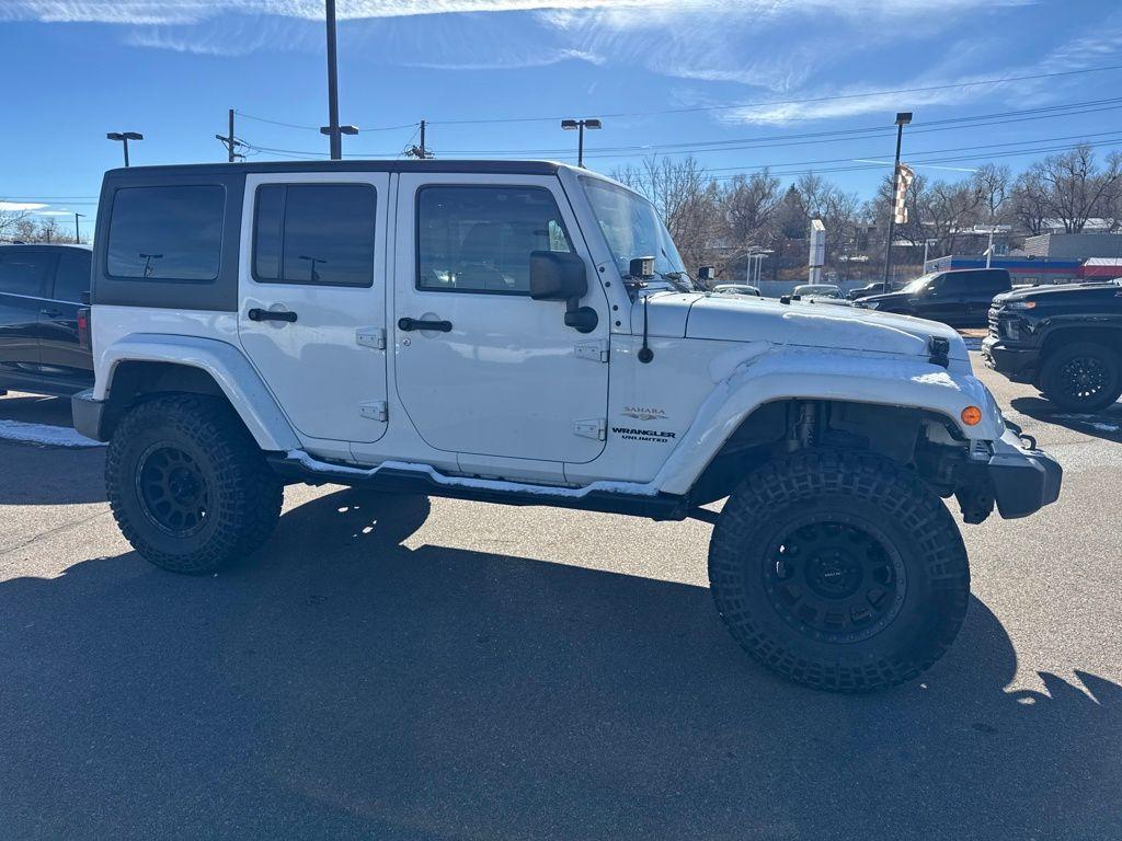 used 2015 Jeep Wrangler Unlimited car, priced at $14,394