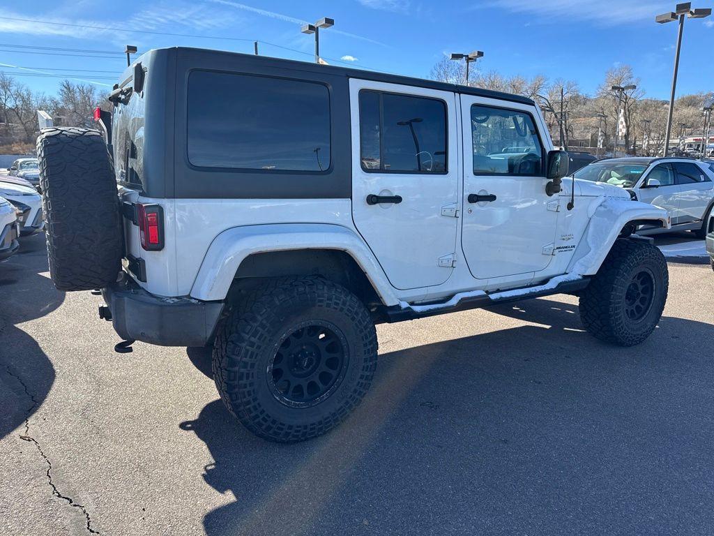 used 2015 Jeep Wrangler Unlimited car, priced at $14,394