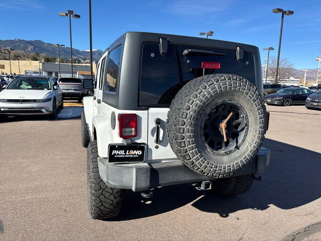 used 2015 Jeep Wrangler Unlimited car, priced at $14,394