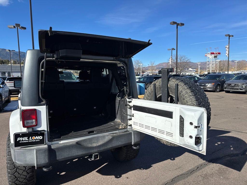 used 2015 Jeep Wrangler Unlimited car, priced at $14,394