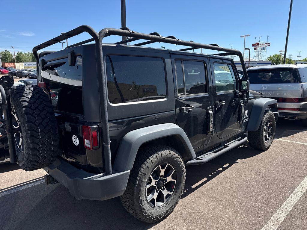 used 2015 Jeep Wrangler Unlimited car, priced at $12,989