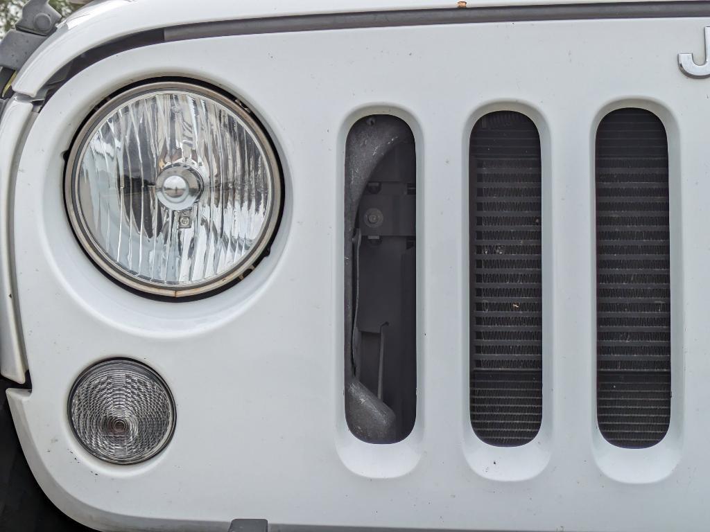 used 2018 Jeep Wrangler JK Unlimited car, priced at $19,384