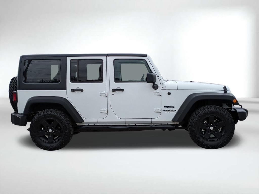 used 2018 Jeep Wrangler JK Unlimited car, priced at $19,384