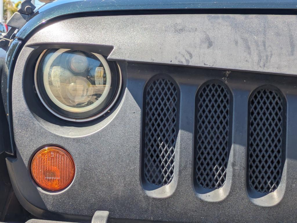 used 2012 Jeep Wrangler Unlimited car, priced at $11,986