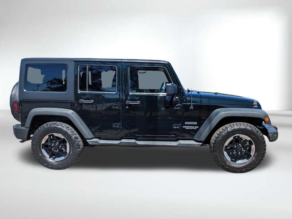 used 2012 Jeep Wrangler Unlimited car, priced at $11,986