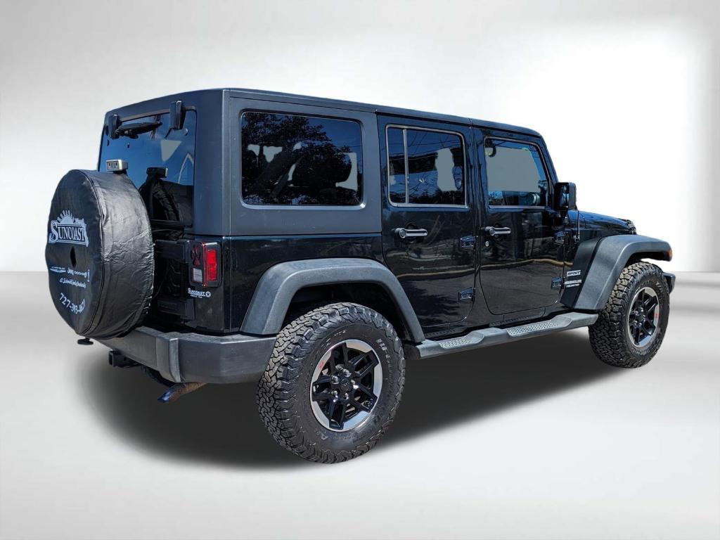 used 2012 Jeep Wrangler Unlimited car, priced at $11,986