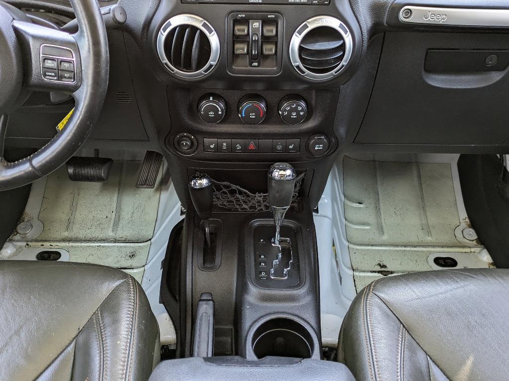 used 2016 Jeep Wrangler Unlimited car, priced at $19,869