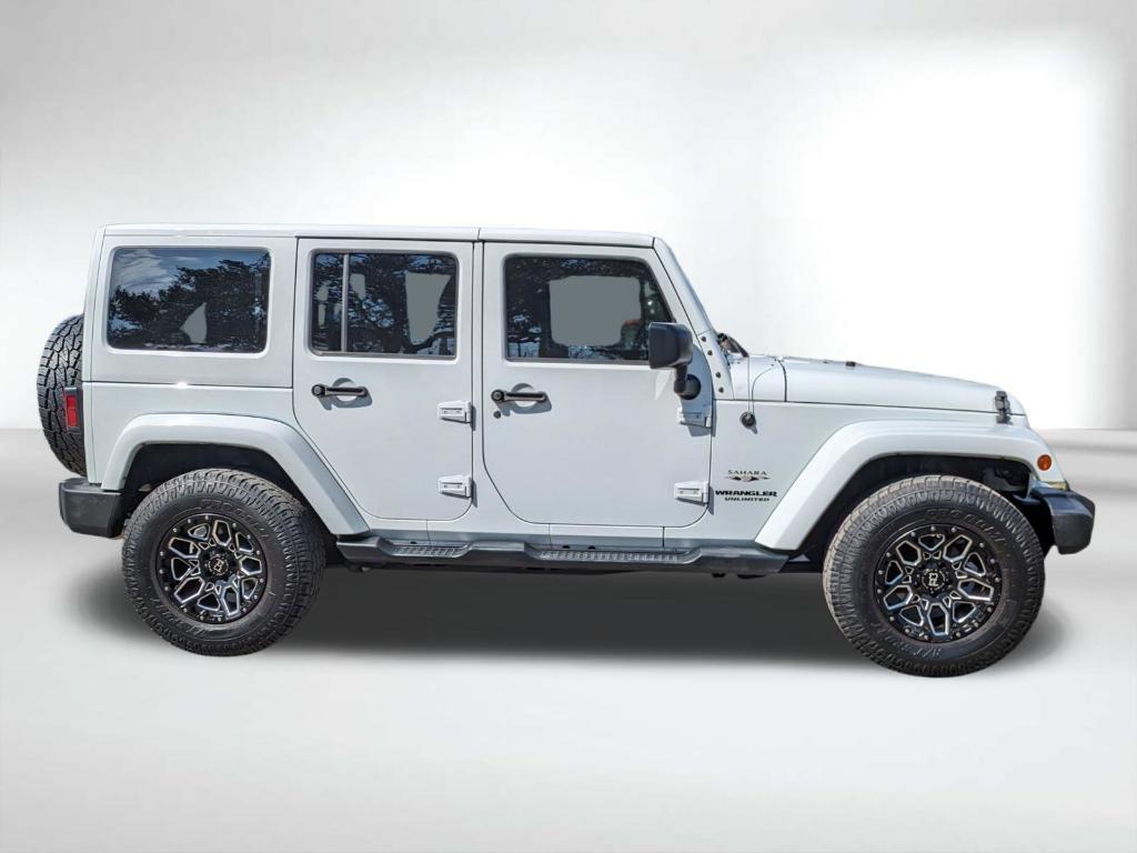 used 2016 Jeep Wrangler Unlimited car, priced at $19,869