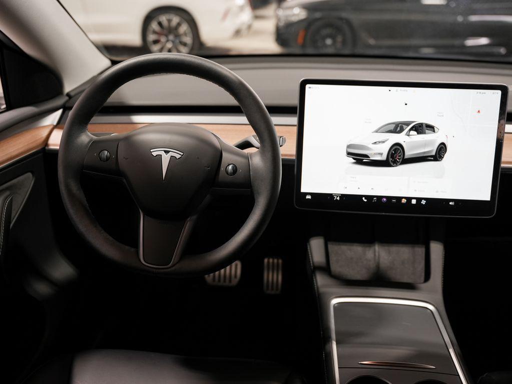 used 2024 Tesla Model Y car, priced at $40,590