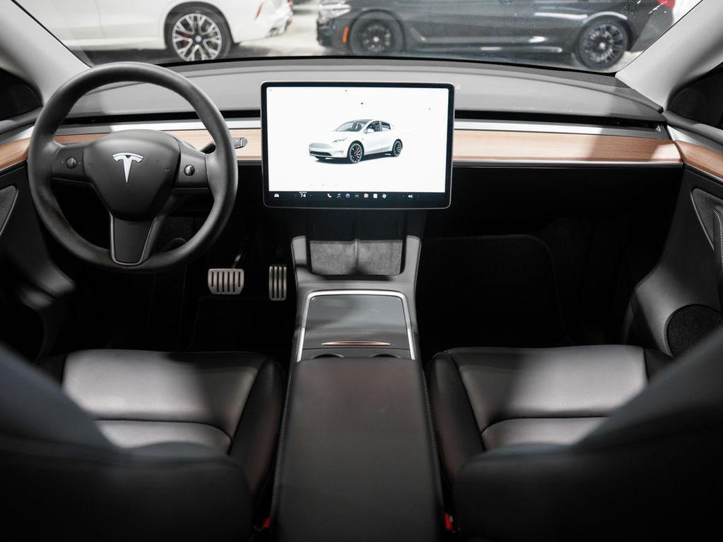 used 2024 Tesla Model Y car, priced at $40,590