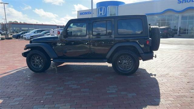 used 2024 Jeep Wrangler car, priced at $34,641