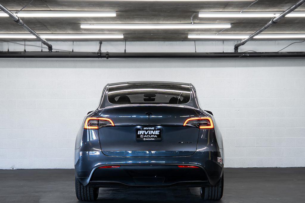 used 2023 Tesla Model Y car, priced at $32,692