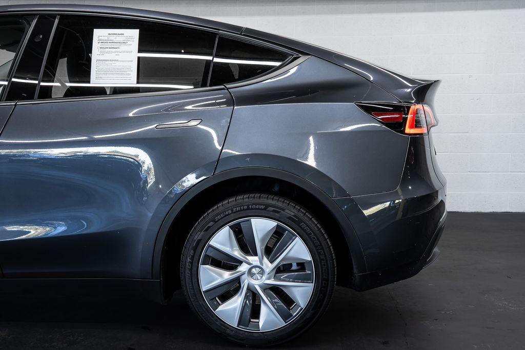 used 2023 Tesla Model Y car, priced at $32,692