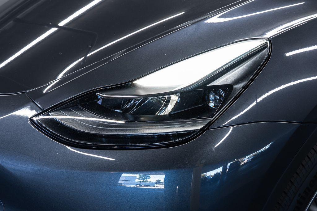 used 2023 Tesla Model Y car, priced at $32,692