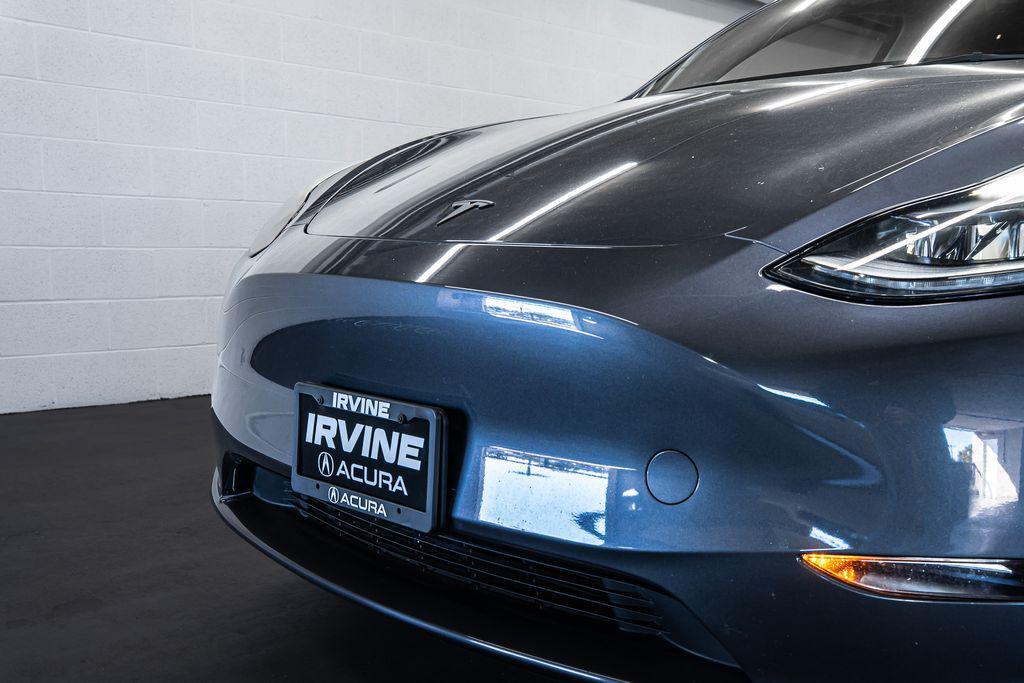 used 2023 Tesla Model Y car, priced at $32,692