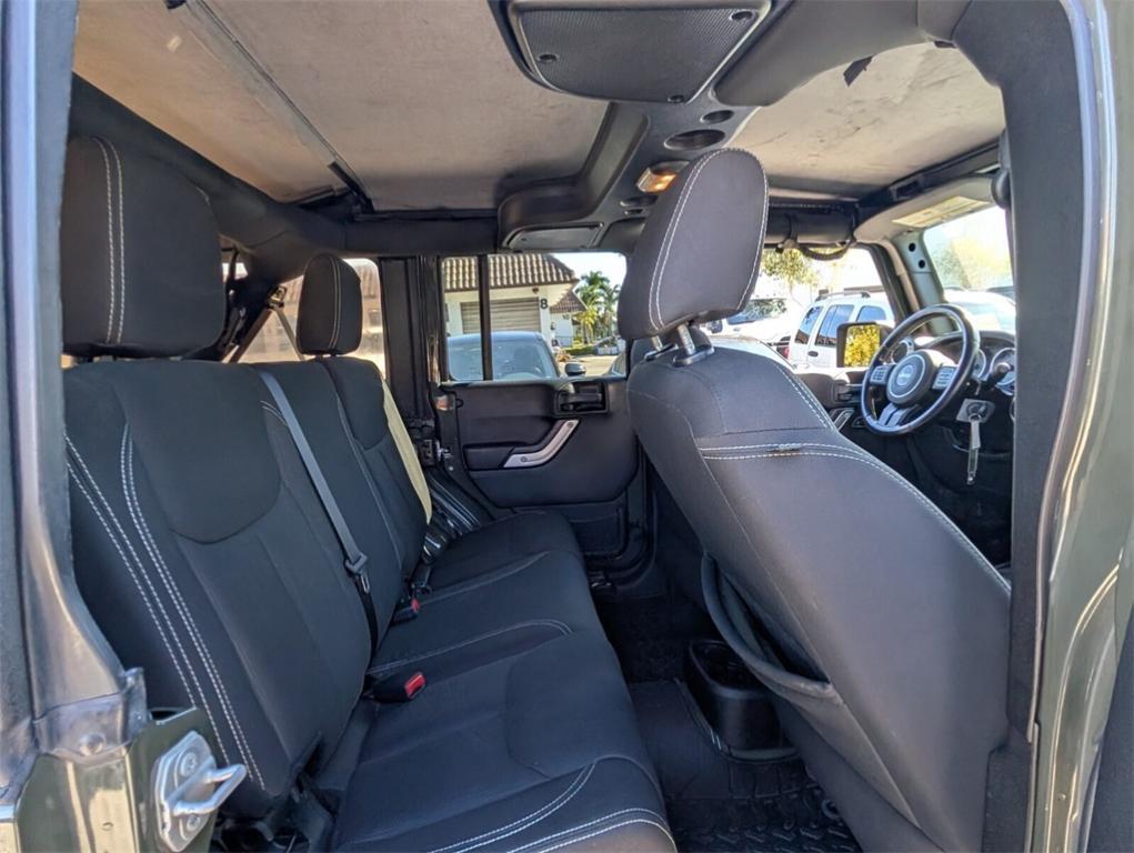 used 2015 Jeep Wrangler Unlimited car, priced at $17,478