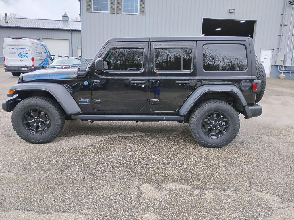 used 2023 Jeep Wrangler 4xe car, priced at $27,995