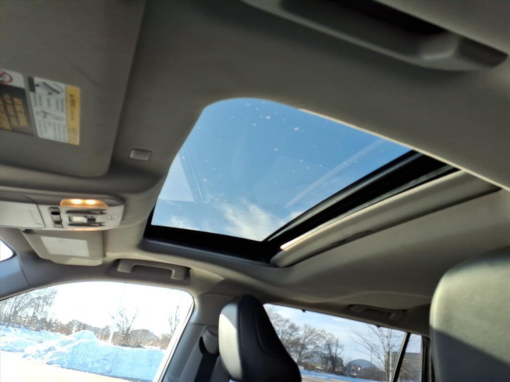 used 2021 Toyota Highlander Hybrid car, priced at $29,999