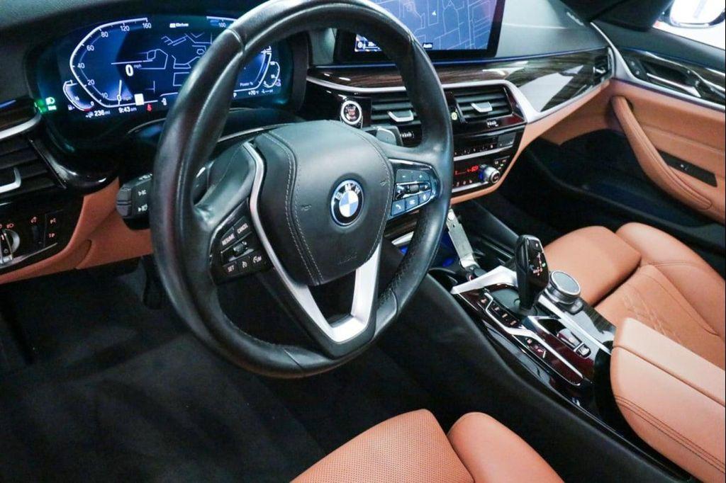 used 2023 BMW 530e car, priced at $27,890