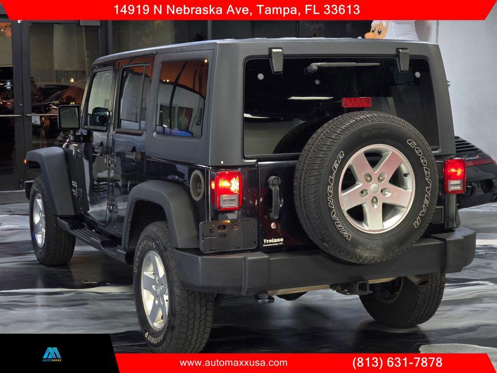used 2014 Jeep Wrangler Unlimited car, priced at $14,495
