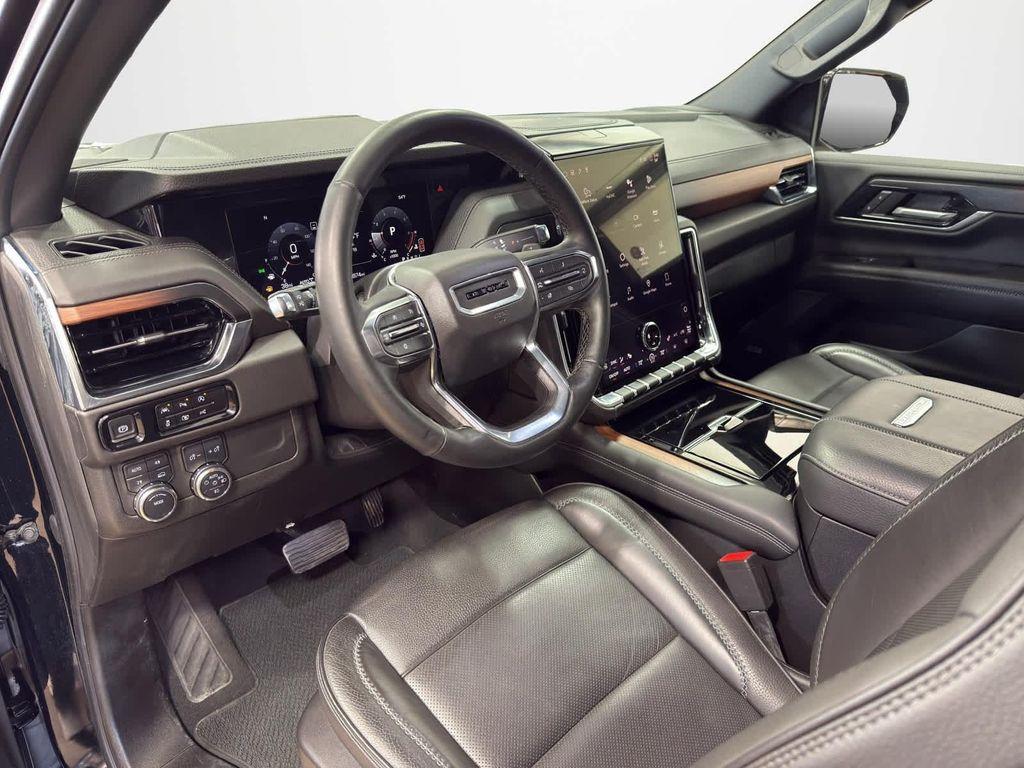 used 2025 GMC Yukon car, priced at $69,695