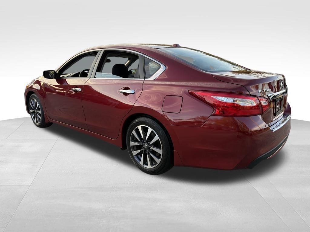 used 2017 Nissan Altima car, priced at $15,000