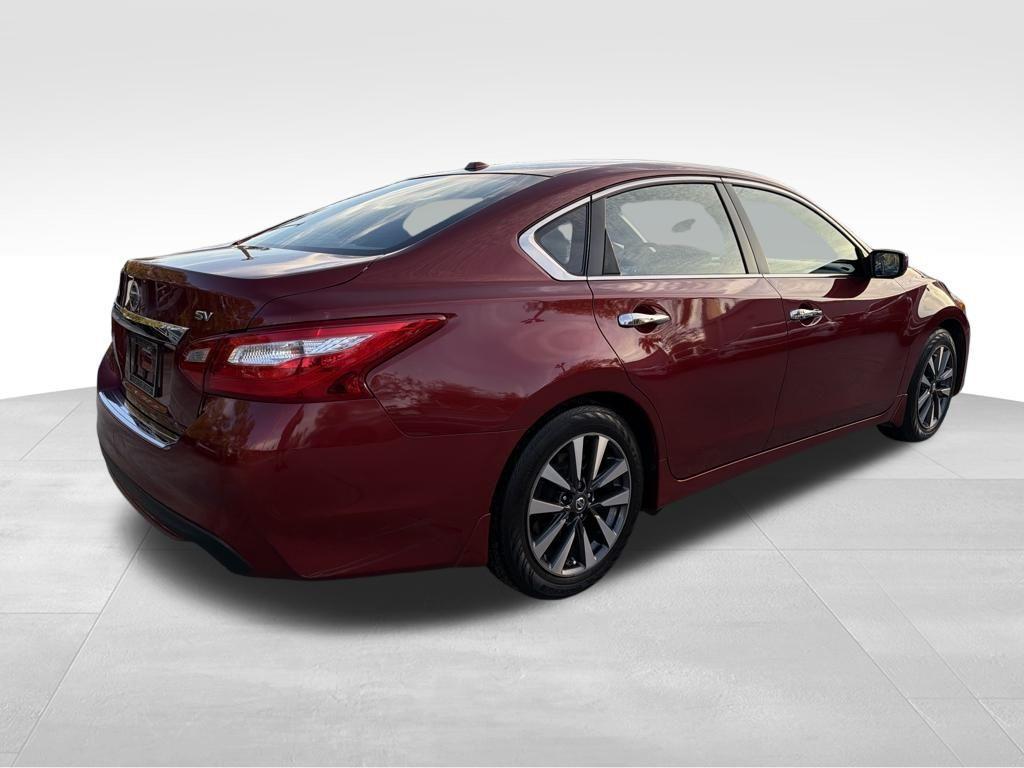 used 2017 Nissan Altima car, priced at $15,000
