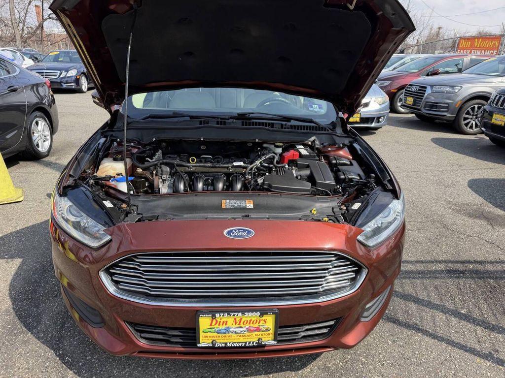 used 2016 Ford Fusion car, priced at $7,589