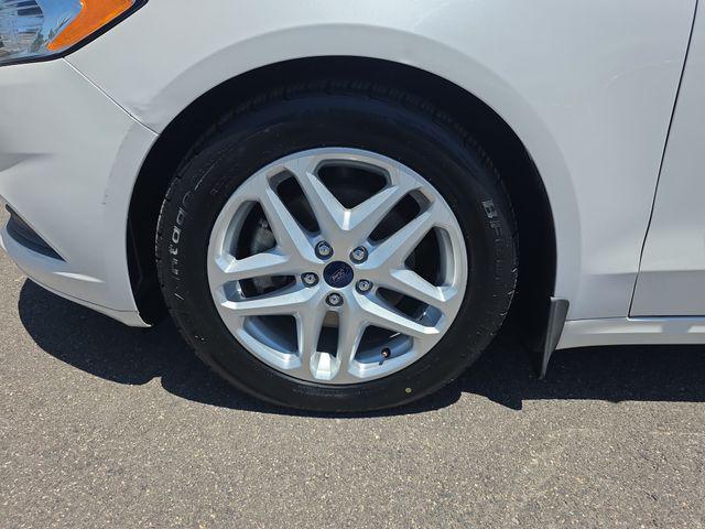 used 2016 Ford Fusion car, priced at $10,479