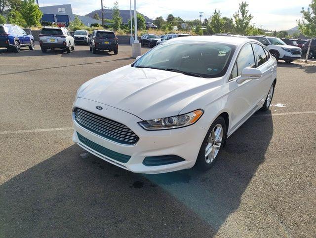 used 2016 Ford Fusion car, priced at $10,479