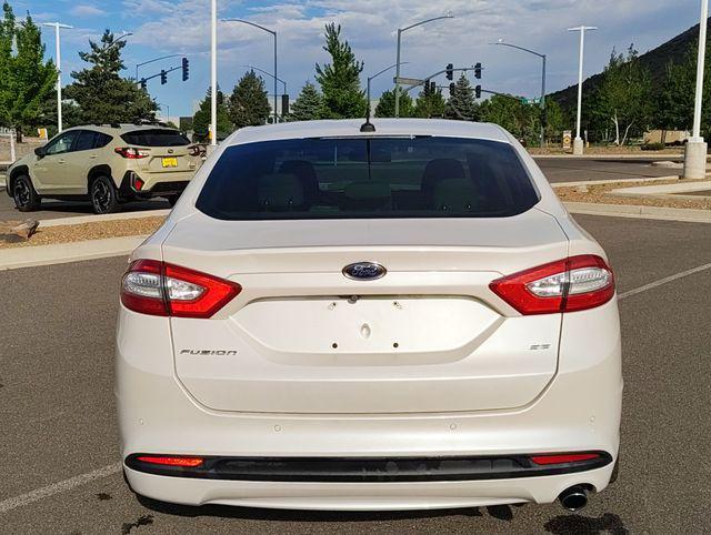 used 2016 Ford Fusion car, priced at $10,479