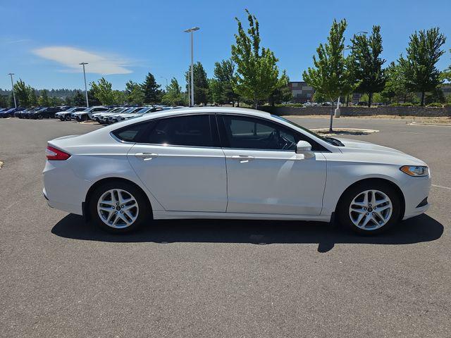 used 2016 Ford Fusion car, priced at $10,479