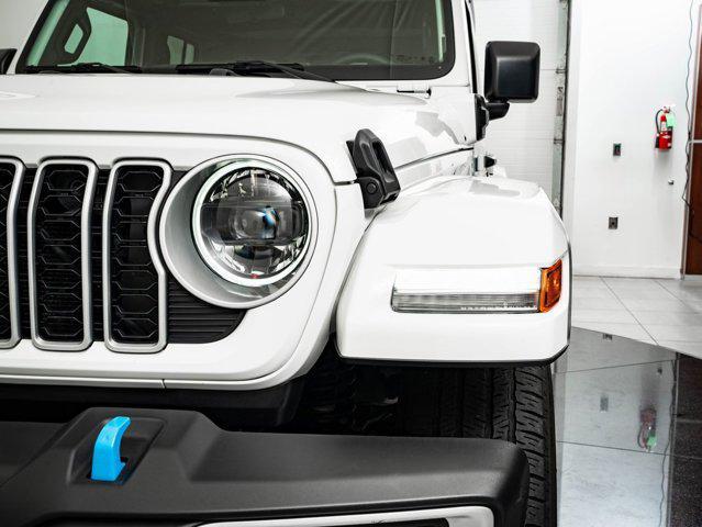 used 2024 Jeep Wrangler 4xe car, priced at $33,698