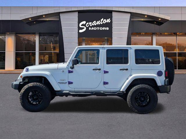 used 2012 Jeep Wrangler Unlimited car, priced at $16,885