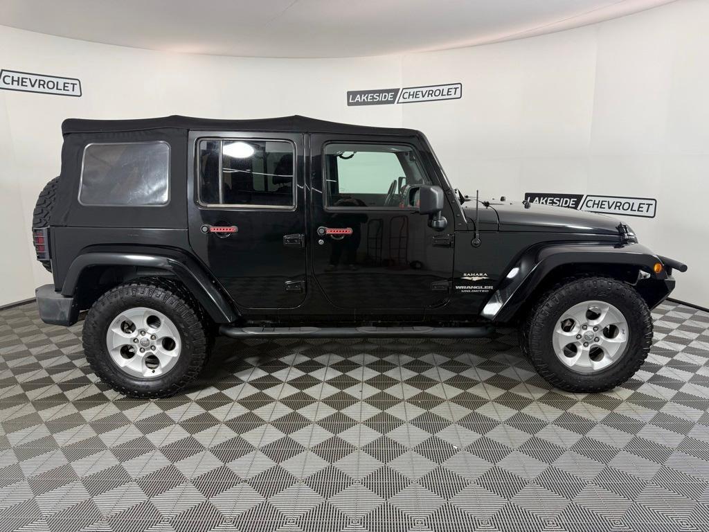 used 2013 Jeep Wrangler Unlimited car, priced at $13,399