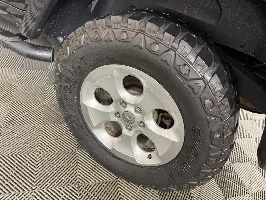 used 2013 Jeep Wrangler Unlimited car, priced at $13,399