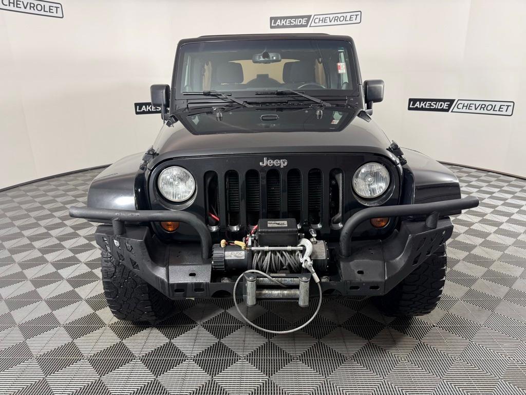 used 2013 Jeep Wrangler Unlimited car, priced at $13,399