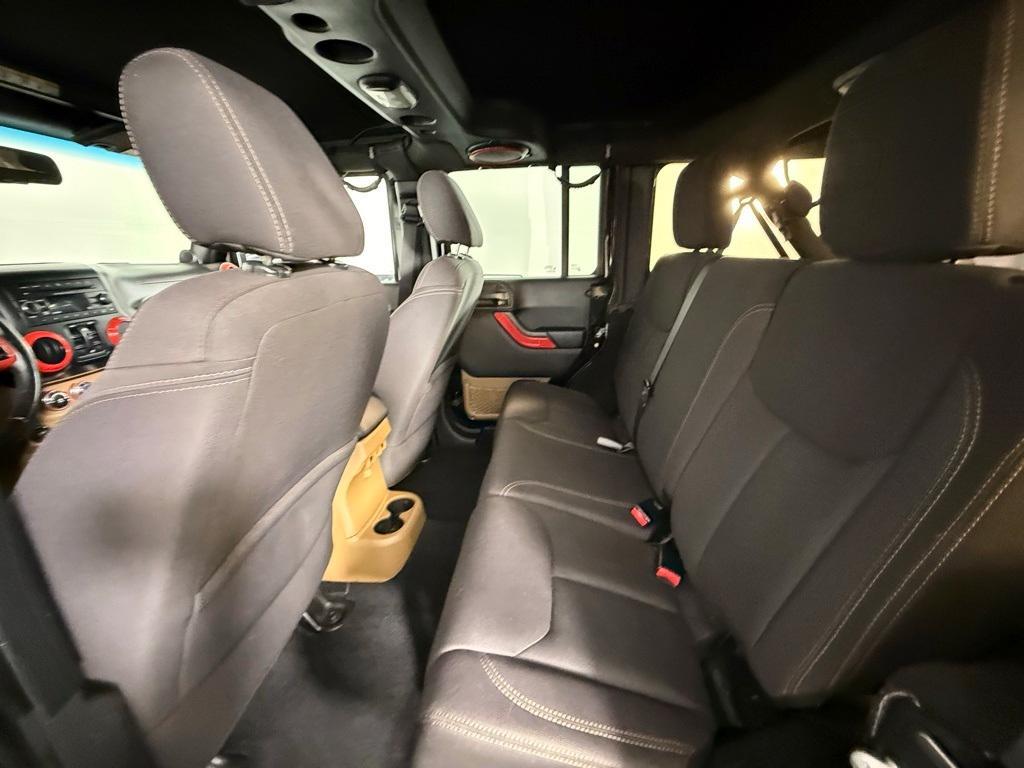 used 2013 Jeep Wrangler Unlimited car, priced at $13,399