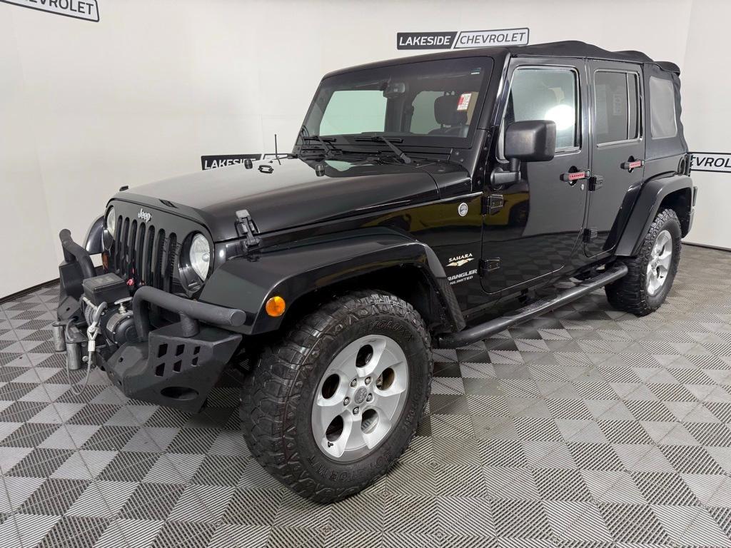 used 2013 Jeep Wrangler Unlimited car, priced at $13,399